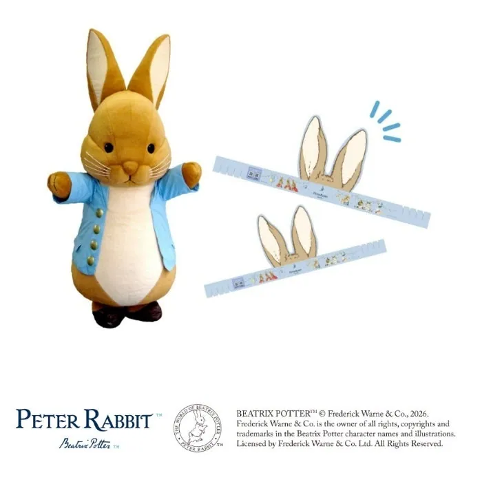 Peter Rabbit™ in costume, alongside the ear headbands given as gifts